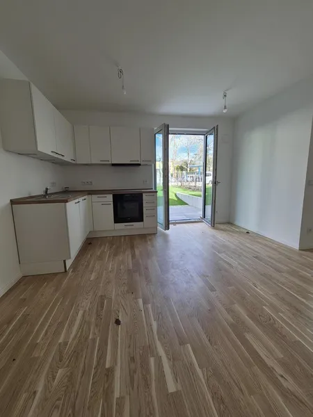 Berlin Lichterfelde 1-Zi-Neubau 2025 42,7  m²  A+: 8,8 kWh/m2a, Privatgarten, Markenküche — photo 1